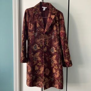 Maroon print car coat. Lovely detail at cuff.